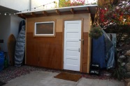 Shed by Ron and George, Hollywood, CA: "Your plan was so helpful in getting us to think about the right things and do them in the right order. This is 10’ x 8’ with Home Depot lumber. The facade is completely reclaimed. We found the pebbled window in a salvage yard for $30 and the tu-tone luan and door came from a gut job in Hollywood next door to my son’s actor friend. We found a pile of bright blue painted plywood that someone had used as a blue screen studio in the garage, but on the flip side was pristine luan, that makes good siding with enough battens behind it... My son is now using this place as an music and audio post studio, and it’s really allowed him to get stuff done."